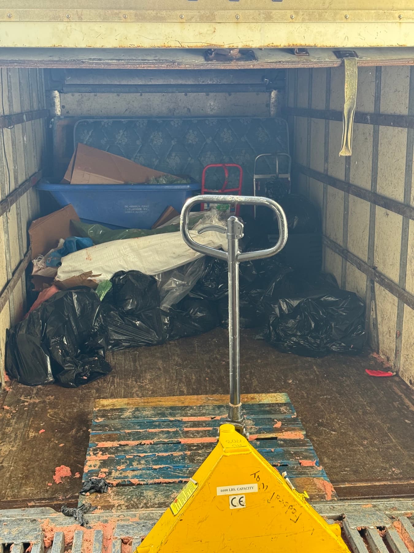 Bagged cleanup load staged for event junk removal
